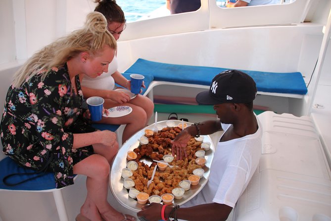 2 Hour Champagne Sunset Cruise from Grace Bay, Providenciales (Adult Only) - Conch fritters, fish strips, and drinks