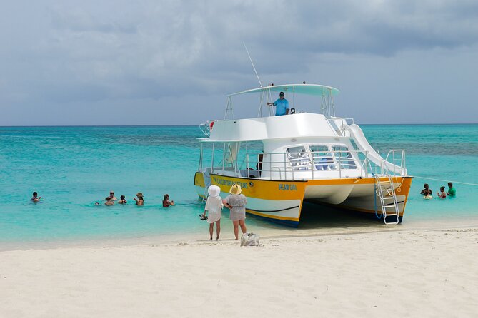 Afternoon Half Day Cruise from Providenciales with Snorkeling and Iguana Island - The boat slide, jumping platform, and turquoise water