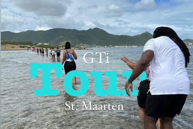 All In One Island Tour of St. Martin | St. Maarten - The border monument and two names for one island