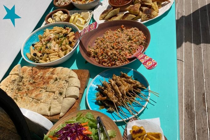 ALL INCLUSIVE Full Day snorkeling & sunset cruise with boat dogs - Lunch is a major part of the value