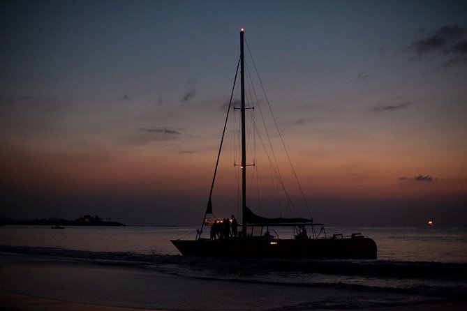 Antigua Sunset Catamaran Cruise From St. John's - Drinks, music, and the social mood