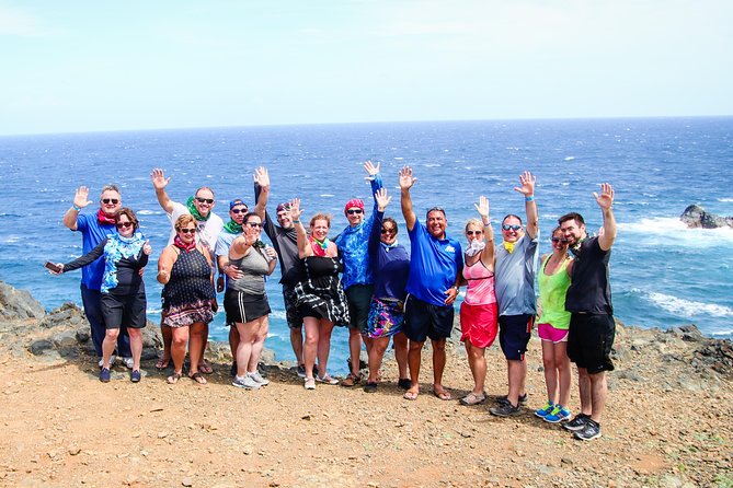 Aruba Jeep Tour: Natural Pool, Caves and Baby Beach Adventure - Cave stops and the island’s older story