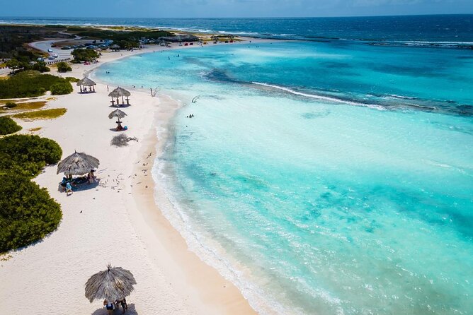 Aruba National Park Tour with Natural Pool & Baby Beach Snorkel - San Nicolas murals on the return drive