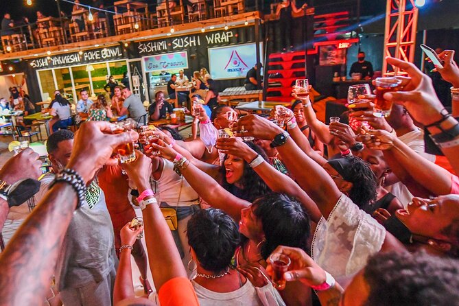 Aruba Nightlife and Barhopping on Chogogo Party Bus - The first toast and the ride through Palm Beach