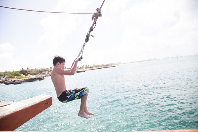 Aruba Sunset Jolly Pirate Sail with Open Bar - Arriving at MooMba Beach and boarding the schooner