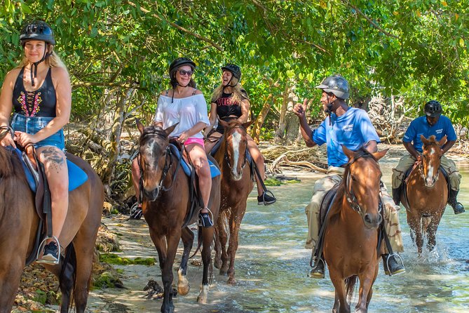 ATV, Horseback Ride, Zipline, Falls Climb + Lunch from Ocho Rios - Dunn’s River Falls, where the climb starts in the sea
