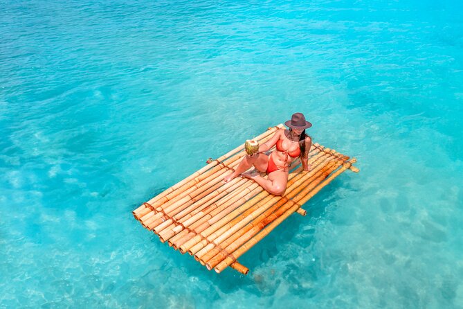 Bamboo Raft Photoshoot + FREE Videos, Shots and Cocktails - How the team helps you pose