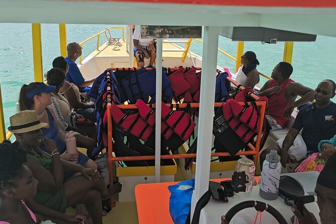 Barbados Glass Bottom Boat Cruise and Snorkeling - A crew that helps beginners