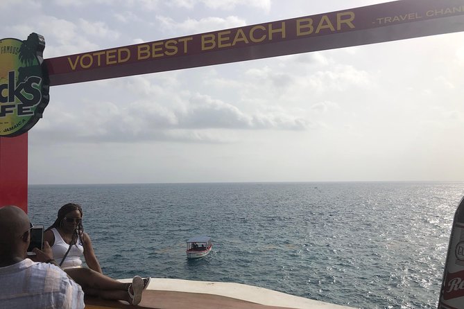 Blue Hole Mineral Springs, Rick's Café, and Shopping Combo Tour - A private West Negril day with three different moods