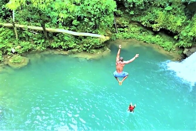 Blue Hole & Secret Falls Day-Trip with Shopping from Grand Palladium - Secret Falls adds a short jungle walk