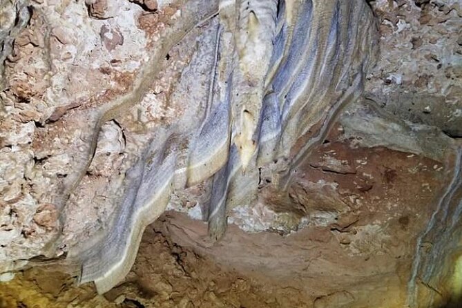 Bonaire Cave Tour: Walk, Climb & Swim - Cave two: coral, lava rock, and natural formations