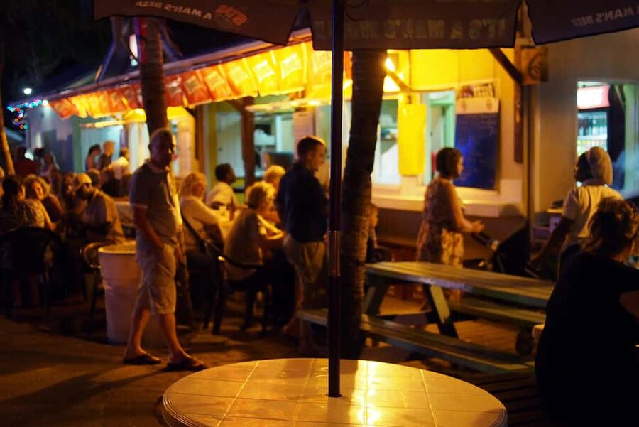 Bridgetown: Oistins reservation with drink & return transfer - Why Oistins Friday night matters