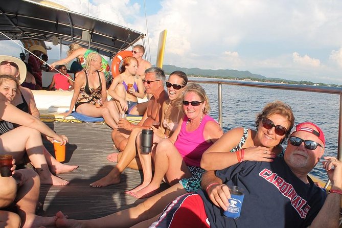 Catamaran Cruise Full Day Tour to Reef, Caves and Negril Beach - Rick’s Cafe at sunset