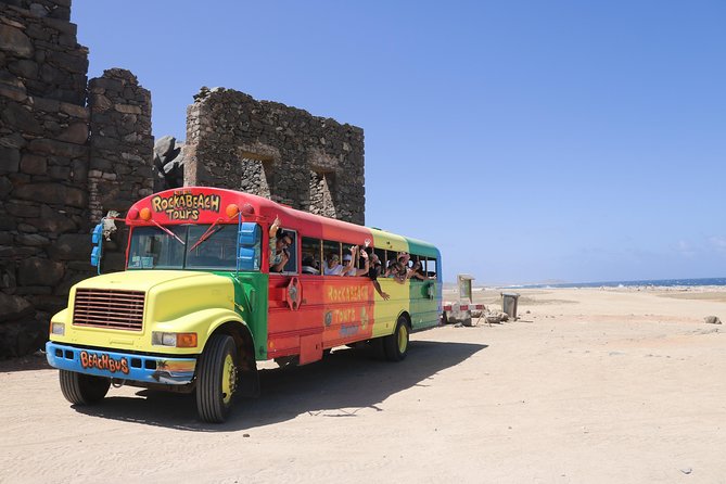 Colorful Beach Bus Sightseeing Tour of Aruba - Natural Bridge: rough north-coast scenery in a short stop