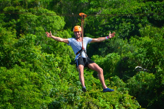 COMBO: Zip Line, Cenote Blue Lagoon, Jungle River &Waterfall Pool - Cooling off at the Waterfall Pool