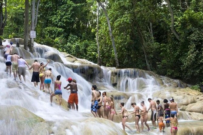 Dunn's River Falls and Horse Back Riding Excursion - Climbing Dunn’s River Falls from the beach