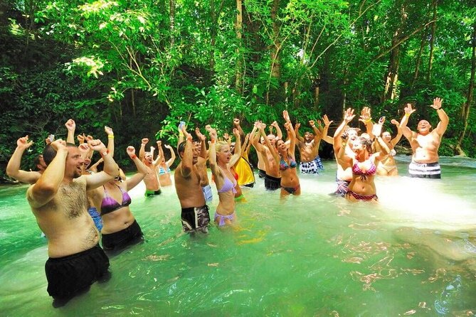 Dunn's River Falls, Blue Hole, Bamboo Rafting, Horseback Combo - A one-hour bamboo raft on the White River