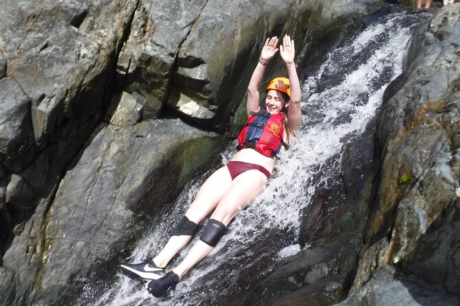 El Yunque Rainforest Tour: Natural Waterslides Adventure - Waterfalls, slides, swings, and jumps