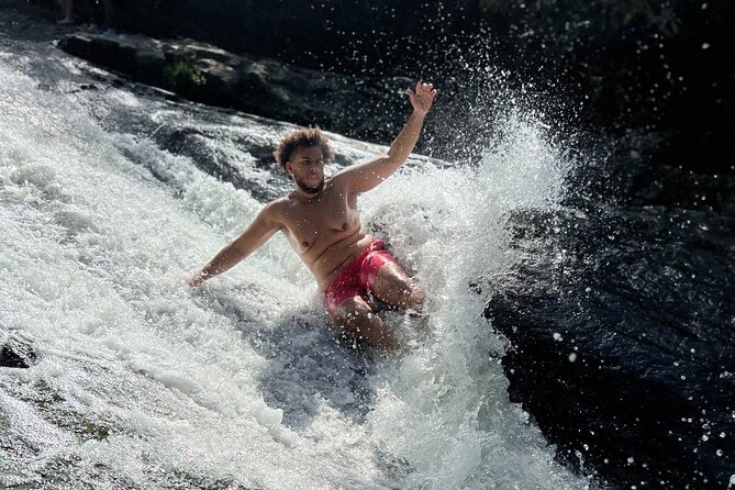 El Yunque Waterslide and Waterfall Tour with Food and Photos - Fitness, safety, and who should skip it