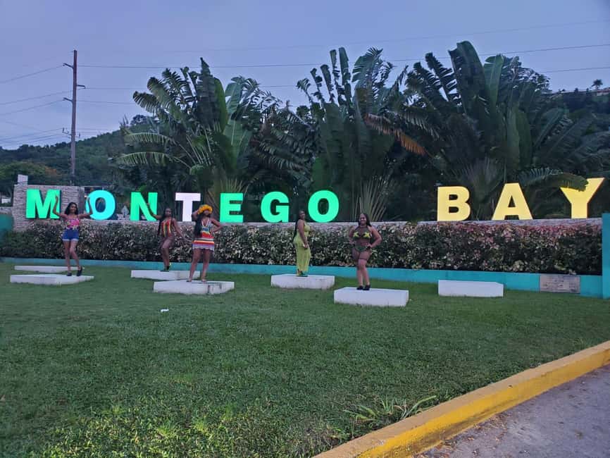 From Montego Bay: Bamboo Rafting & Limestone Massage Tour - Boarding the 30-foot bamboo raft