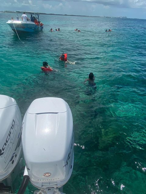 From Nassau: Swim with Pigs Safari - Small boats, music, and the crew