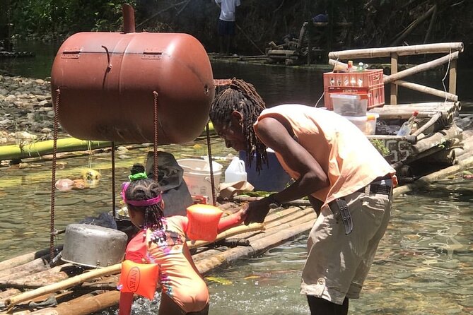 Great River Bamboo Rafting and Limestone Full Body Massage Tour From Montego Bay - Swimming, rain, and time on the water