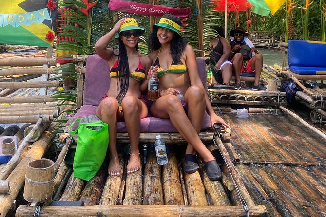 Great River bamboo Rafting and Margaritaville from Montego Bay - Boarding a handcrafted 30-foot raft