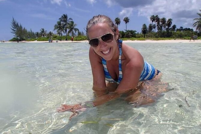 Half Day Private Boat Charter in Grand Cayman - Custom stops, beach bars, and lunch