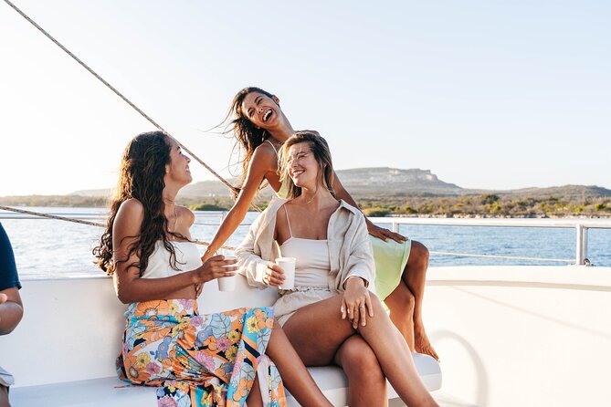 Happy Hour Sunset Cruise - Sailing toward St. Anna Bay and the harbor