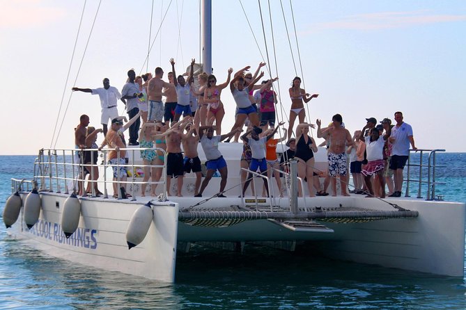 Jamaica Dunn's River Falls Party Cruise with Snorkeling - A catamaran day built around Dunn’s River Falls