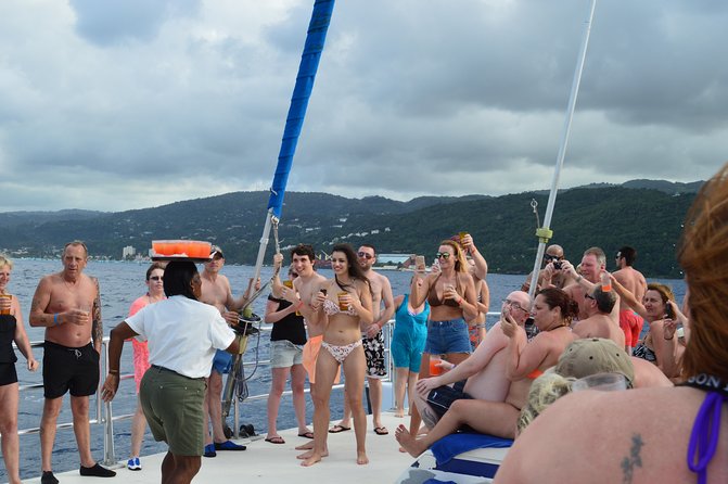 Jamaica Dunn's River Falls Party Cruise with Snorkeling - Snorkeling over coral and tropical fish