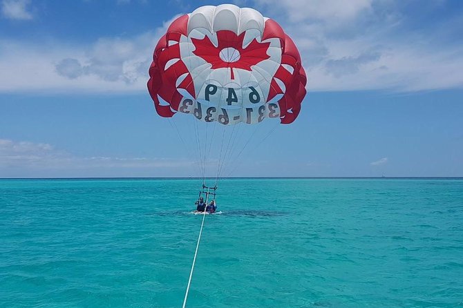 Key to the Sea Parasailing- Birds Eye View of the Best Beach in the world - Photos, videos, water, and juice on board