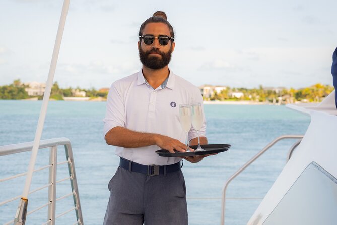 Lady Grace Signature Catamaran Sunset Sail from Ritz-Carlton - A Barefoot Welcome and a Glass of Champagne