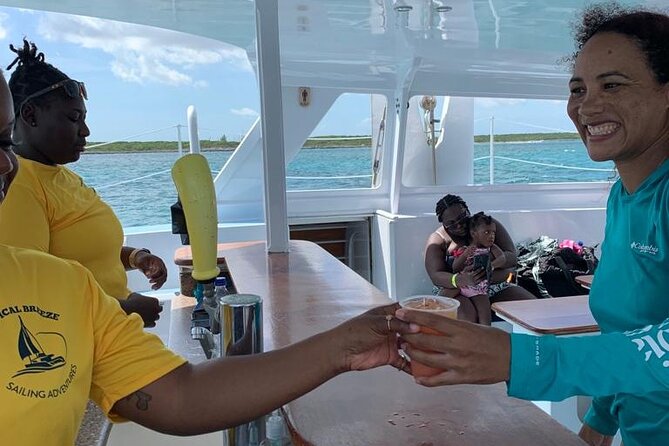 Luxury Catamaran Cruise: Sip, Sail, Snorkel, and Swim with Pigs! - Sailing past Paradise Island toward Rose Island