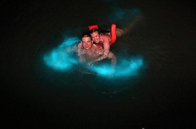 Mystic Luminescent Lagoon Night Cruise & Swim in Jamaica - Swimming in the glowing water