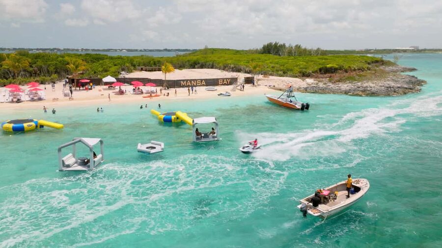 Nassau: Swimming Pigs, Snorkeling, Lunch, & Beach Boat Tour - Snorkeling over a reef after the beach stop