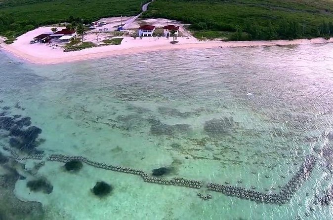 Paradise Cove Day Pass with Pickup from Freeport - Snorkeling, Kayaking, and Paddleboards