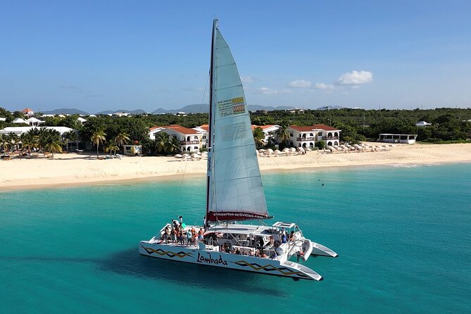 Prickly Pear Catamaran Trip from St Maarten Including Lunch - Sailing west along St. Maarten’s coast