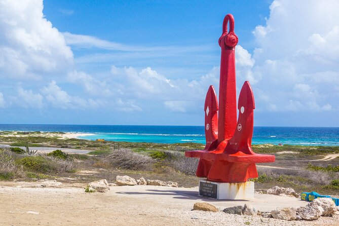 Private Aruba Beach Hop and Snorkel Experience - Tres Trapi: clear water and a turtle search