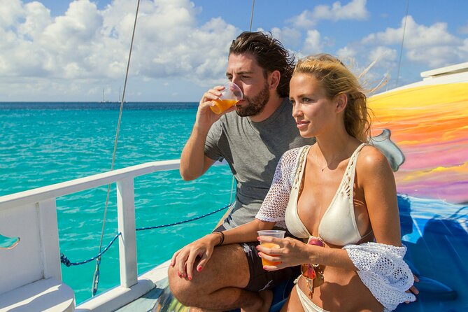 Private Catamaran Adventure Cruise with Rope Swing and Water Slide - Two Aruba snorkel stops in one short cruise