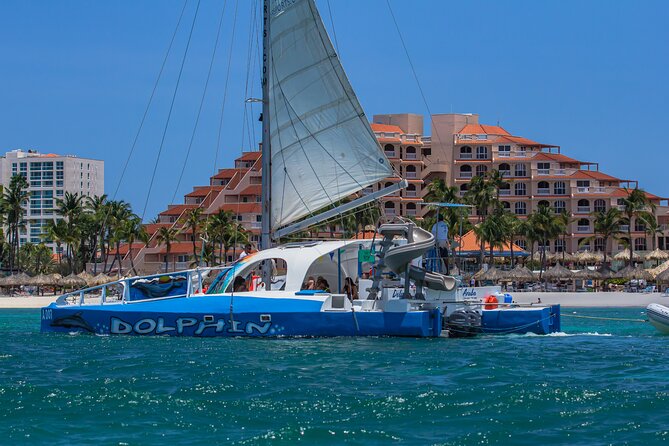 Private Catamaran Adventure Cruise with Rope Swing and Water Slide - Timing, check-in, and weather matter