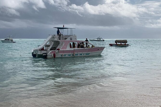 Private Party Boat with Slide and chicken skewers at Punta Cana - Food, drinks, and the rhythm of the party