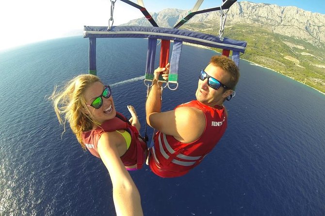 Punta Cana Combo Tour: Snorkeling, Catamaran Cruise & Parasailing - Parasailing over the Cortesito coast