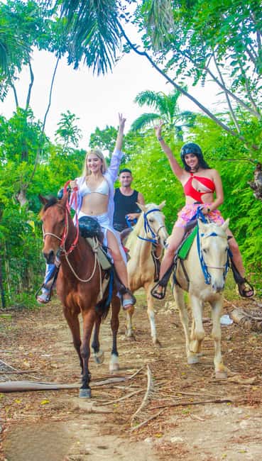 Punta Cana Horseback riding & Sunset + beach + free pick-up - Riding through fields toward the coast