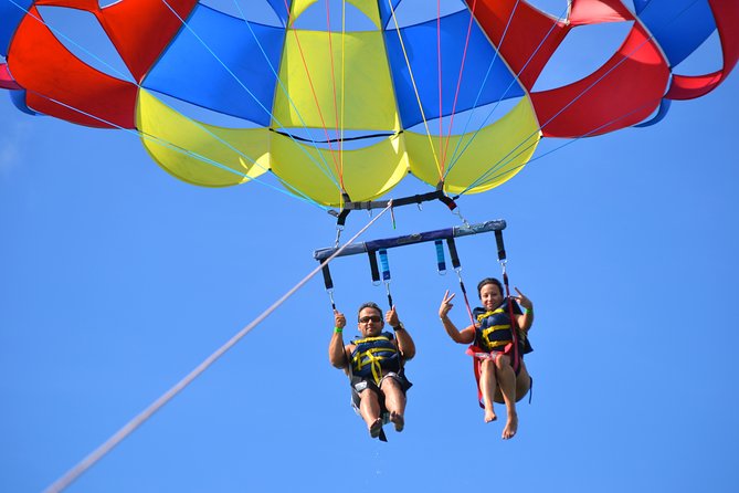 Punta Cana Party Cruise with Snorkeling, Hooka Diving and Parasailing - Parasailing above the coast