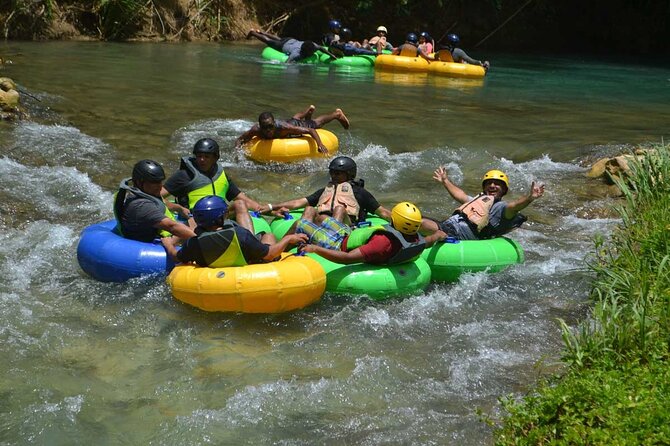 River Rapids Waterfalls Tubing and Beach Adventure with Transport - The old stone bridge and the final raft section