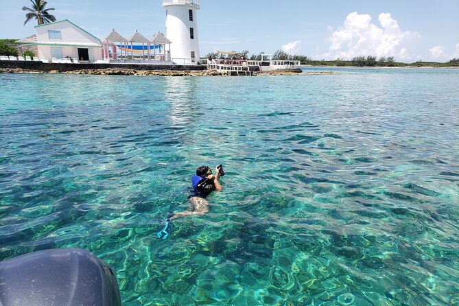 Rose Island: Private Snorkeling, Fishing, and Swimming with Pigs - Leaving New Providence past Paradise Island