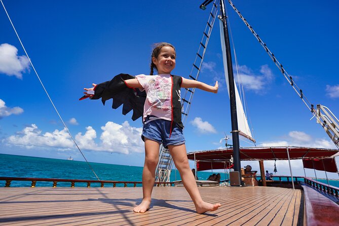 Set Sail in Aruba: Jolly Pirate Cruise with Snorkel Adventure - The rope swing adds a burst of courage