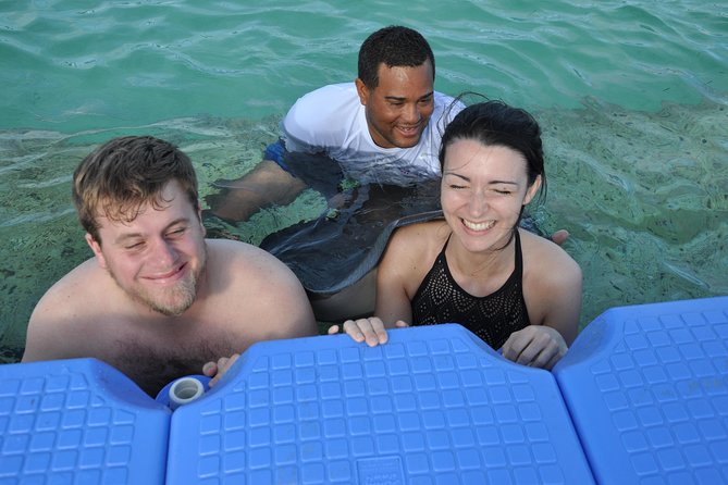 Small Group Snorkeling, Sharks & Stingrays Encounter by boat - Snorkeling over shallow Caribbean water