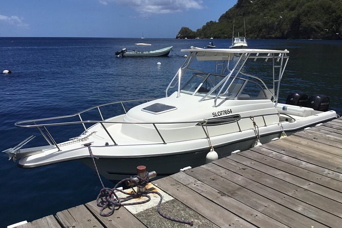 St. Lucia Private Boat Tour, Mud Bath, Waterfall & Beach Time - The Pitons, film views, and the ride south
